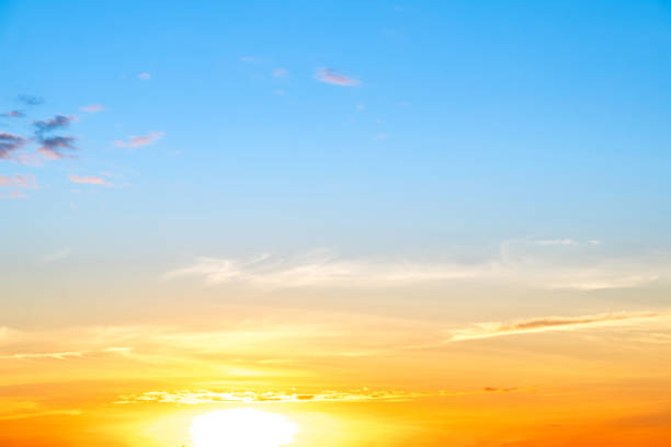 istock Sky,sunset, beautiful , luxury soft gradient orange gold clouds and sunlight on the blue sky perfect for the background, Sunrise on morning or everning in winter warm time ,Twilight summer,silhouette 2191846930
