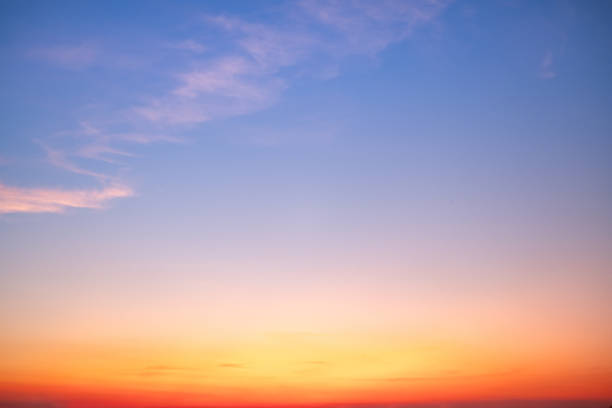 istock Sky,sunset, beautiful , luxury soft gradient orange gold clouds and sunlight on the blue sky perfect for the background, Sunrise on morning or everning in winter warm time ,Twilight summer,silhouette 2191846993