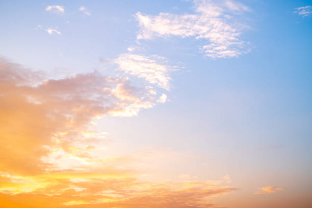 istock Beautiful , luxury soft gradient orange gold clouds and sunlight on the blue sky perfect for the background, take in evening,Twilight, Large size, high definition landscape photo 2191847275