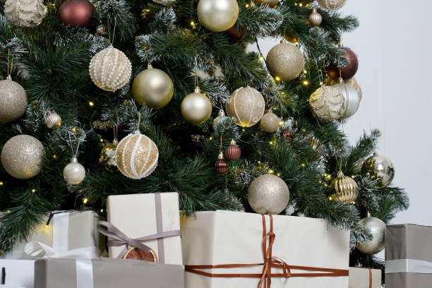 istock Decorative Christmas tree adorned with elegant ornaments and gifts 2191850221