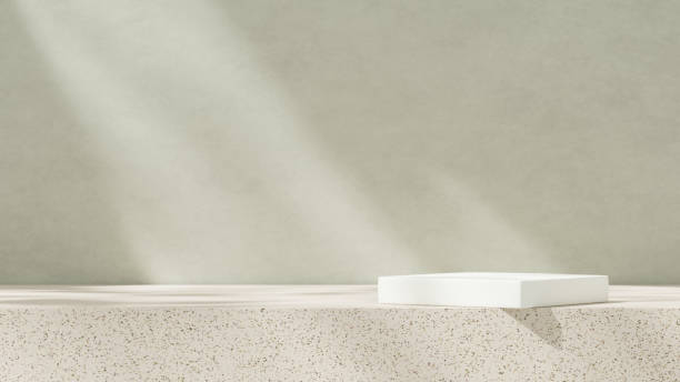 istock 3D rendering of an empty mockup featuring a ceramic-textured podium against a simple green wall in a landscape layout. 2191852575