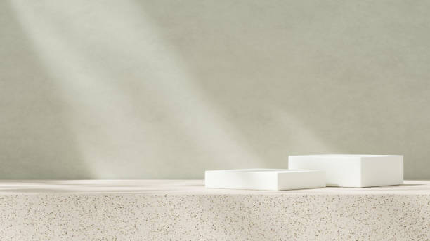 istock 3D rendering of an empty mockup featuring a ceramic-textured podium against a simple green wall in a landscape layout. 2191852576