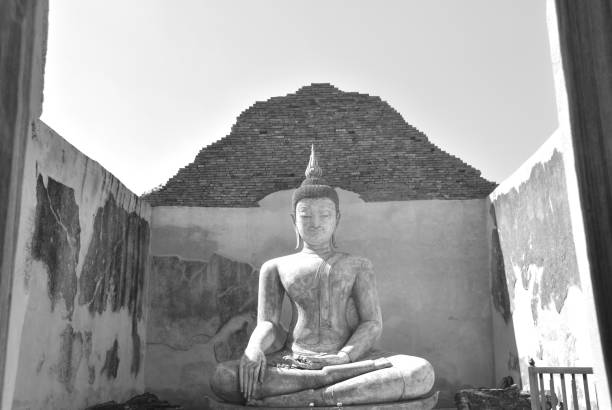 ancient Buddha at Wora Chet Tha Ram temple travel location in Thailand