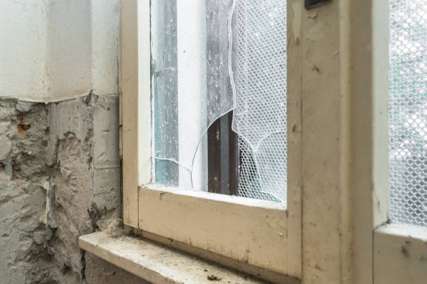 istock Glass of old window broken 2191855266