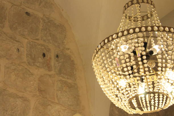 istock Crystal Chandelier in Stone Room 2191855599