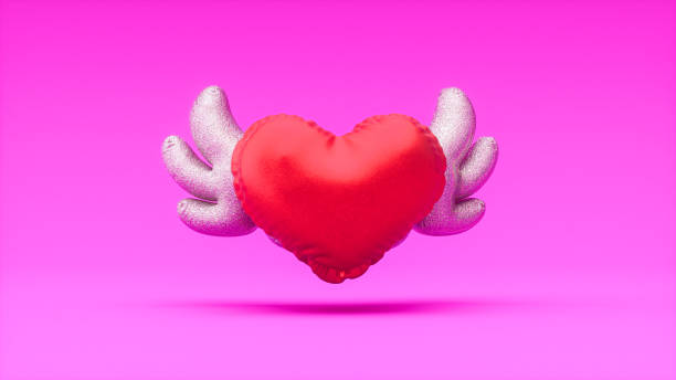 Abstract background made of glowing light trails  forming a heart shape. Space for copy. Can be used as a design for Valentine's day holiday greeting cards, posters, some romantic backgrounds, etc.