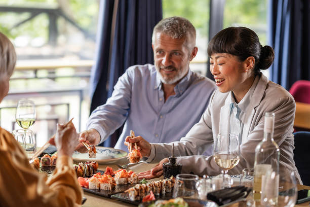 istock Photo of cheerful diners in restaurant 2191857215