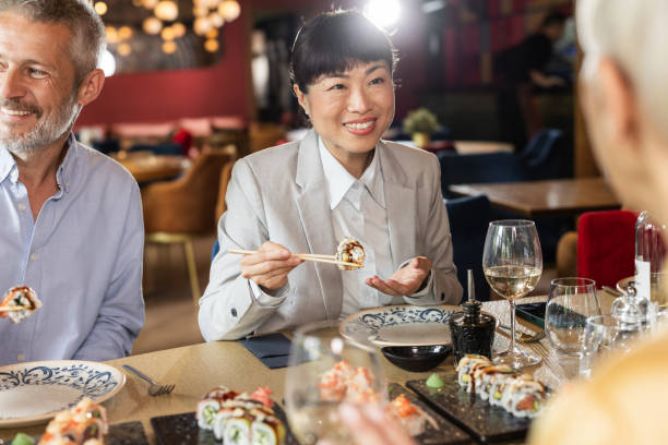 istock Group of friends enjoying in a restaurant 2191857238