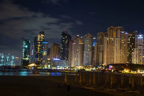 15.12.2024, Panoramic view on buildings and architecture by night, Dubai, United Arab Emirates