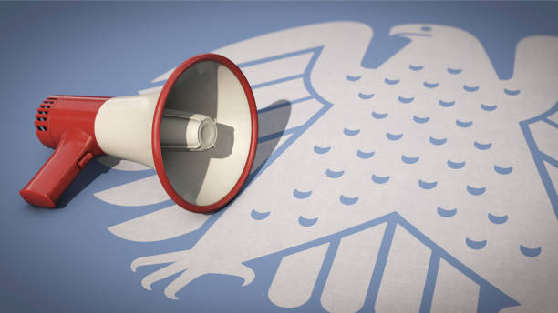 Megaphone on German Bundestag eagle Symbolic image: Megaphone on German Bundestag eagle bundestag stock pictures, royalty-free photos & images