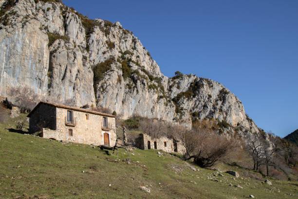 istock Stone house against mountain landscape 2191859851
