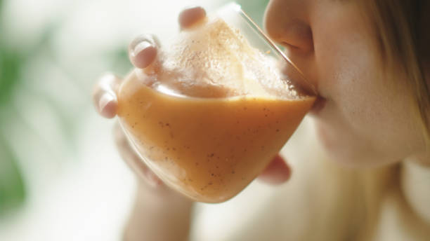 istock Woman drinking smoothie juice. 2191866111