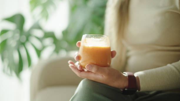 istock Woman drinking smoothie juice. 2191866113