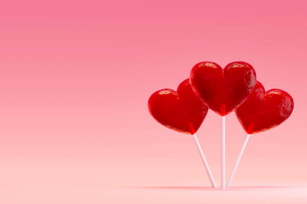 Valentine's Day, heart shaped lollipop on pink background. Digitally generated image. 3d render.
