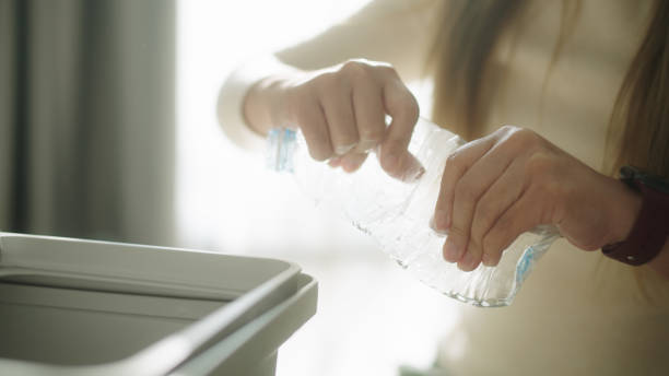 istock Woman waste separation plastic at home. 2191867519