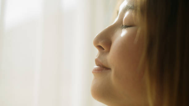 istock Woman with eye closed. 2191867802