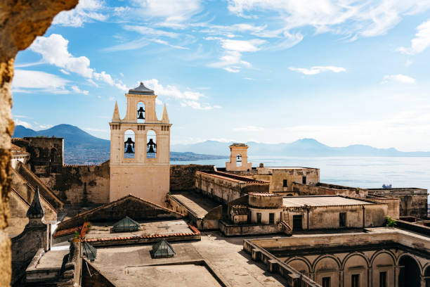Historical Bell Tower Overlooking the Coast in Naples, Italy on a Sunny Day stock photo