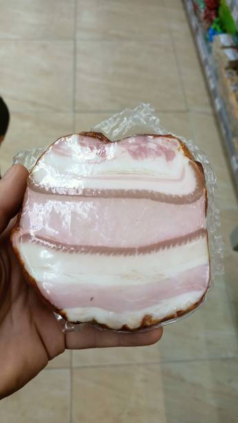 Pig fat with skin in a vacuum package Love and Enjoy at Any Occasion