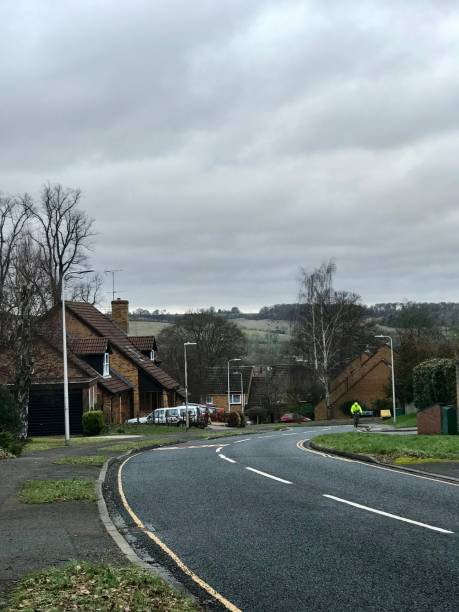 istock Bend in Road in rural area with cyclist 2191879238