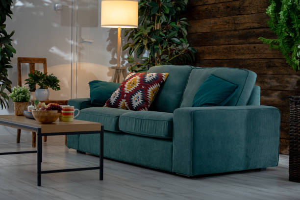 istock A Cozy Living Room Featuring a Stylish Sofa Surrounded by Beautiful Greenery and Decor 2191880993