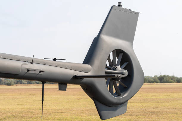 istock Gray painted modern H145M military transport helicopter tail rotor 2191886682