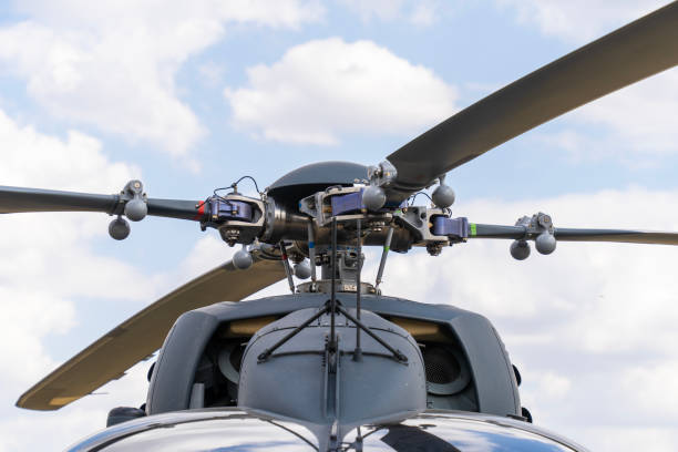 Gray painted modern military transport helicopter main rotor