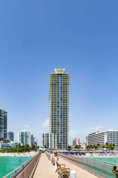 pier on Jade beach in Sunny Isles Beach, USA. Jade Beach and Ocean were completed in 2009 with a elevation of 549 feet located at 170th Street.