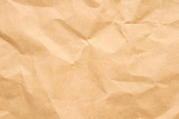 istock Abstract crumpled and creased recycle brown paper texture background 2191890646