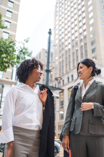 istock Dynamic business women commuting in bustling city center 2191890752