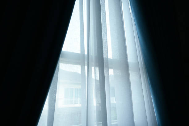 istock black and white curtain on the window in home, interior design 2191905151