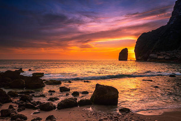 istock Amazing tropical beach with colorful sunset above the ocean 2191905232