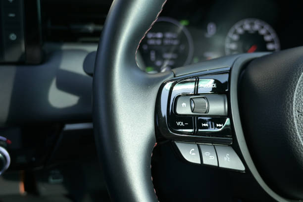 istock interior view of car with black leather, steering wheel with button 2191906210