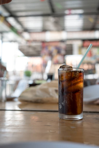 istock Glass of ice soft drink in table. 2191906465