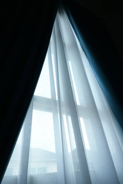 istock black and white curtain on the window in home, interior design 2191907897