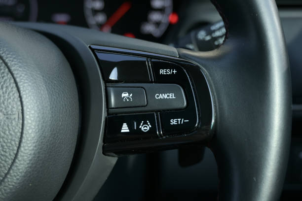 istock interior view of car with black leather, steering wheel with button 2191909887