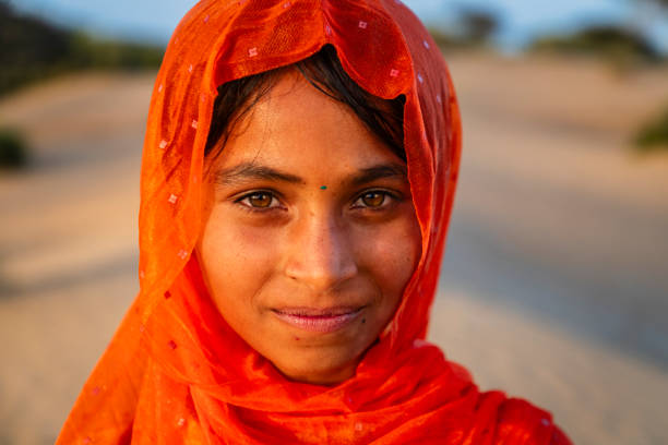 Happy Indian girl in desert village, India Happy Gypsy Indian girl from desert village, Thar Desert, Rajasthan, India indian wedding stock pictures, royalty-free photos & images