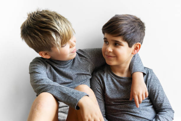 Vintage photo of a couple of brothers at home.