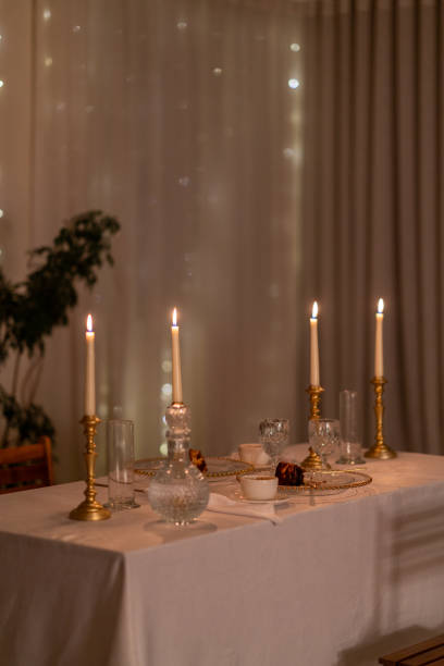 istock Elegant table setting with burning candles creating a romantic ambiance for dinner 2191936225