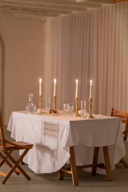 istock Elegant table setting with burning candles creating a warm ambiance for a romantic dinner 2191936248