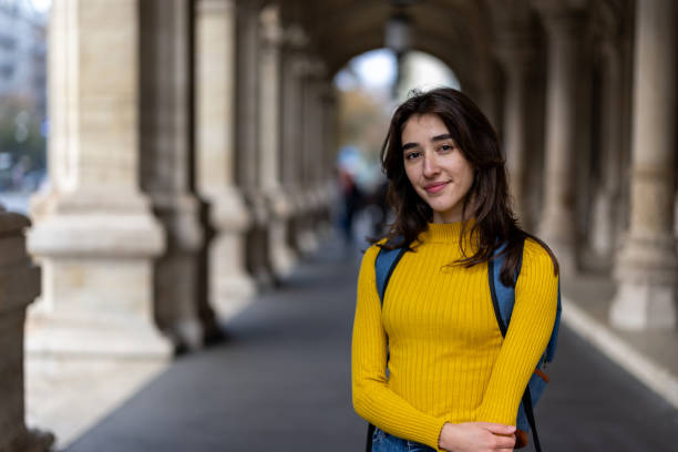 istock Young female student in front of college building 2191938683