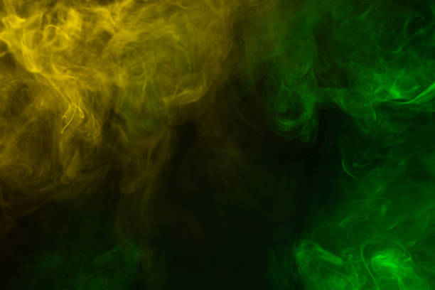 istock Yellow steam on a black background. 2191943675