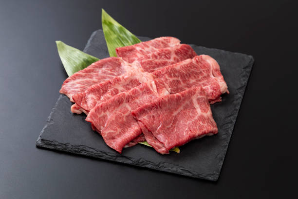 istock Beef shoulder loin for sukiyaki on a black background 2191951515