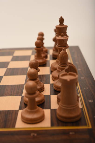 Black and white chess. Wooden chess on a board. A chess game.