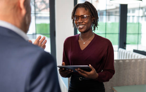 istock Two business person discussing inside modern office 2191955584