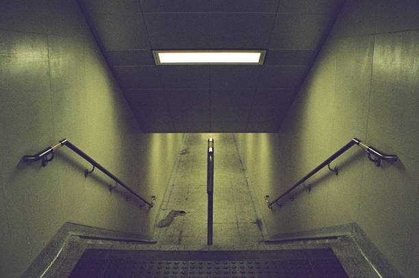 An yellowing imposing subway hallway