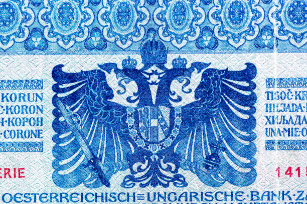 istock Vintage elements of old paper banknotes.Bonistics.Austro-Hungarian banknote 1000 Kronen from 1902, II. AUFLAGE. Overprinted in red DeutschösterreichFragment banknote for design purpose. 2191963473