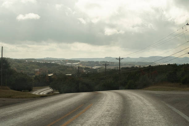 istock Winding Road approaches a Texas lake town 2191967451