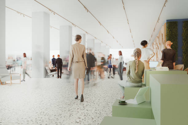 istock Businesswoman walking in office lobby 2191969461