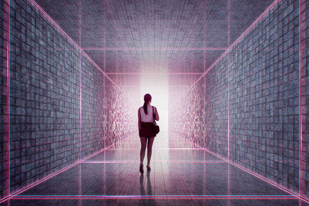 istock Young woman walking in empty futuristic corridor 2191969584