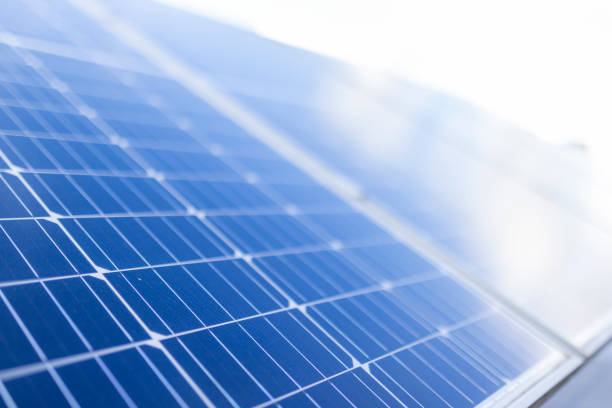 View of modern photovoltaic solar panels for battery charging. Rows of sustainable energy solar panels installed on the roof.  The concept of environmental ecology